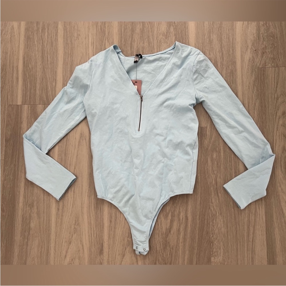 Maverick Sky Blue Long Sleeve Zip Front Bodysuit Size Large NWT